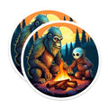 (2 Pack) Bigfoot Alien Campfire Stickers - Sasquatch Extraterrestrial Art - Forest Adventure Cryptid Decal - 5" On Longest Side - Sticks to Smooth Flat Surfaces - Made in USA - BMCS21493
