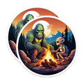 (2 Pack) Bigfoot Alien Campfire Stickers - Sasquatch Extraterrestrial Adventure - Quirky Cryptid Forest Night Art - 5" On Longest Side - Sticks to Smooth Flat Surfaces - Made in USA - BMCS21284